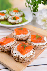 Delicious canapes on table close-up