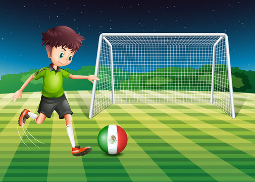 A boy kicking the ball with the flag of Mexico