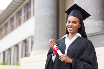 african female student with graduation certificate