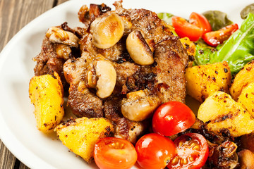 Fried pork chop with mushrooms