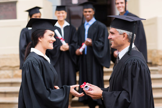 Young Graduate Receiving Diploma