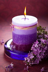 Obraz na płótnie Canvas Candle and lilac