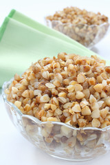 Cooked buckwheat in the glass bowl