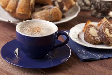 Cap of coffee with marable ring cake