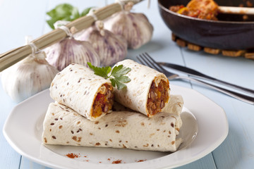 burritos wraps with meat beans and vegetables