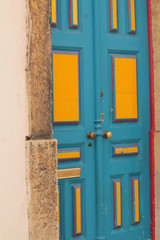 door painted blue and yellow,portugal europe