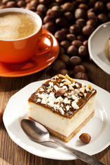 cheesecake with nuts on plate