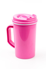 Pink plastic glass isolated white background