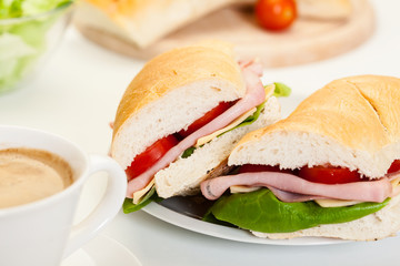 Panini sandwich with ham, cheese and tomato