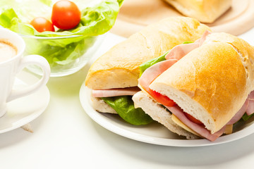 Panini sandwich with ham, cheese and tomato