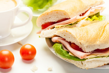 Panini sandwich with ham, cheese and tomato