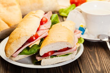 Panini sandwich with ham, cheese and tomato