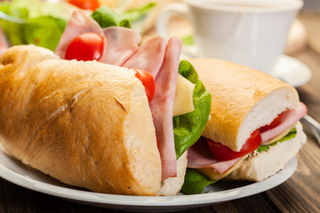 Panini sandwich with ham, cheese and tomato