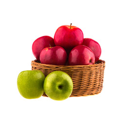 Red and green apples in a wooden basket
