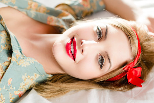 Beautiful Blonde Pinup Young Woman Lying In Bed