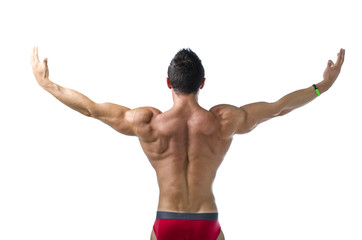 Back of young bodybuilder with arms spread open