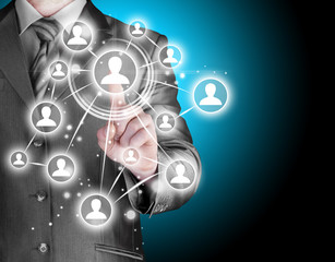 Businessman pressing modern social buttons
