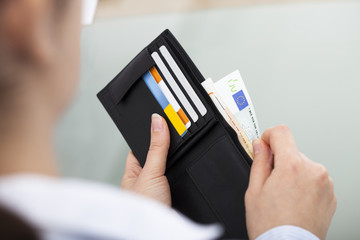 Businessperson With Open Wallet