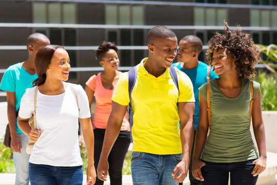 african american college students walking together