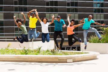 group of african college students jumping