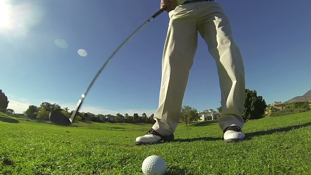 Slow Motion - Golfer Hits Chip Shot
