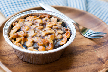 Close up image of walnut toffee cake