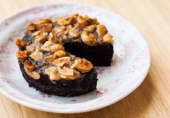 Close up image of walnut toffee cake