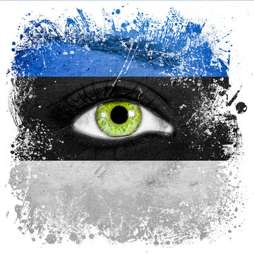 Estonia flag painted on face with green eye