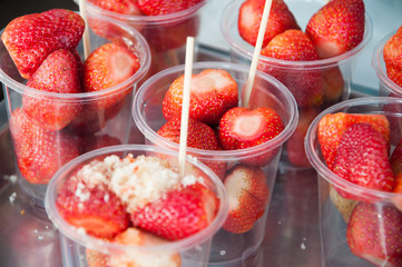 Strawberry in plastic cup