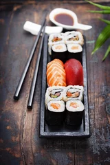 Fotobehang sushi with chopsticks © Natalia Klenova