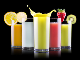 tasty summer fruit drinks in glass with splash