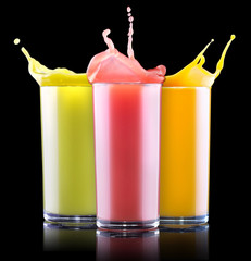 tasty summer fruit drinks in glass with splash