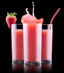 Smoothies of strawberry in glass with splash
