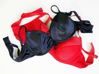 Black and pink bra on white