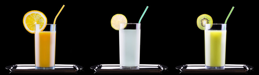 tasty summer fruits with juice in glass