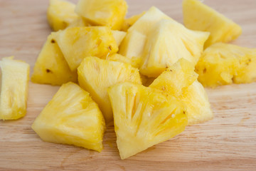 Pineapple slices on the wooden