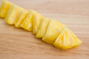 Pineapple slices on the wooden