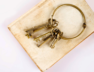 old keys on old book