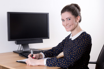 beautiful business woman working in office and computer with bla