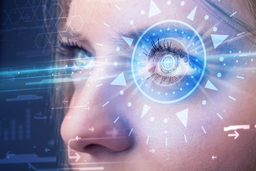Cyber girl with technolgy eye looking into blue iris