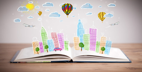 cityscape drawing on open book