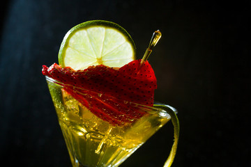 Cocktail with fresh lime and strawberry
