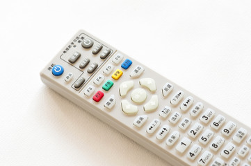 A remote control on a white background