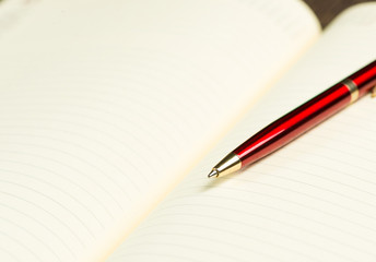 pen and open notepad