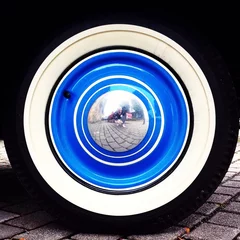 Foto op Plexiglas blue old wheel © christianmutter