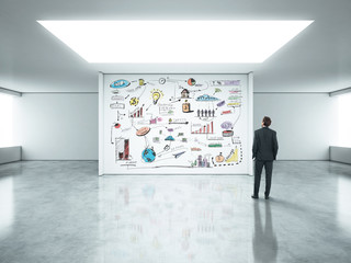 Fototapeta premium businessman standing in bright office