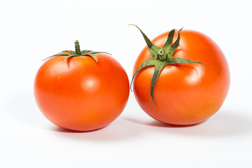 Tomatoes on white background, studio