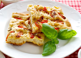 Focaccia with tomatoes and oregano