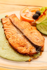 salmon steak with vegetables