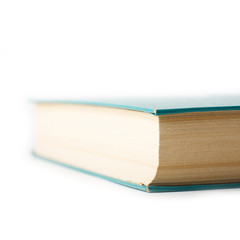 Isolated closed book with a few bookmarks